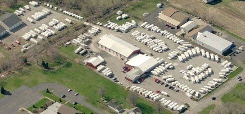 Moores Rv travel trailers motor homes fold down campers storage lot service department indoor storage barns